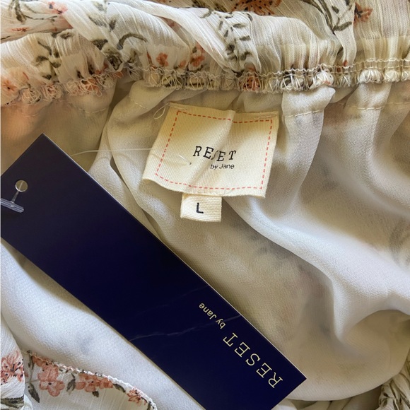 NWT Floral Ruffle Romper - Picture 5 of 5